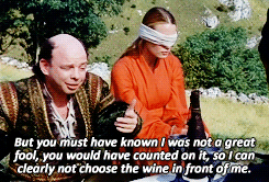 A GIF of Vizzini from The Princess Bride giving a convoluted explanation to the Dread Pirate Roberts as to why he cannot trust the wine in his own cup.