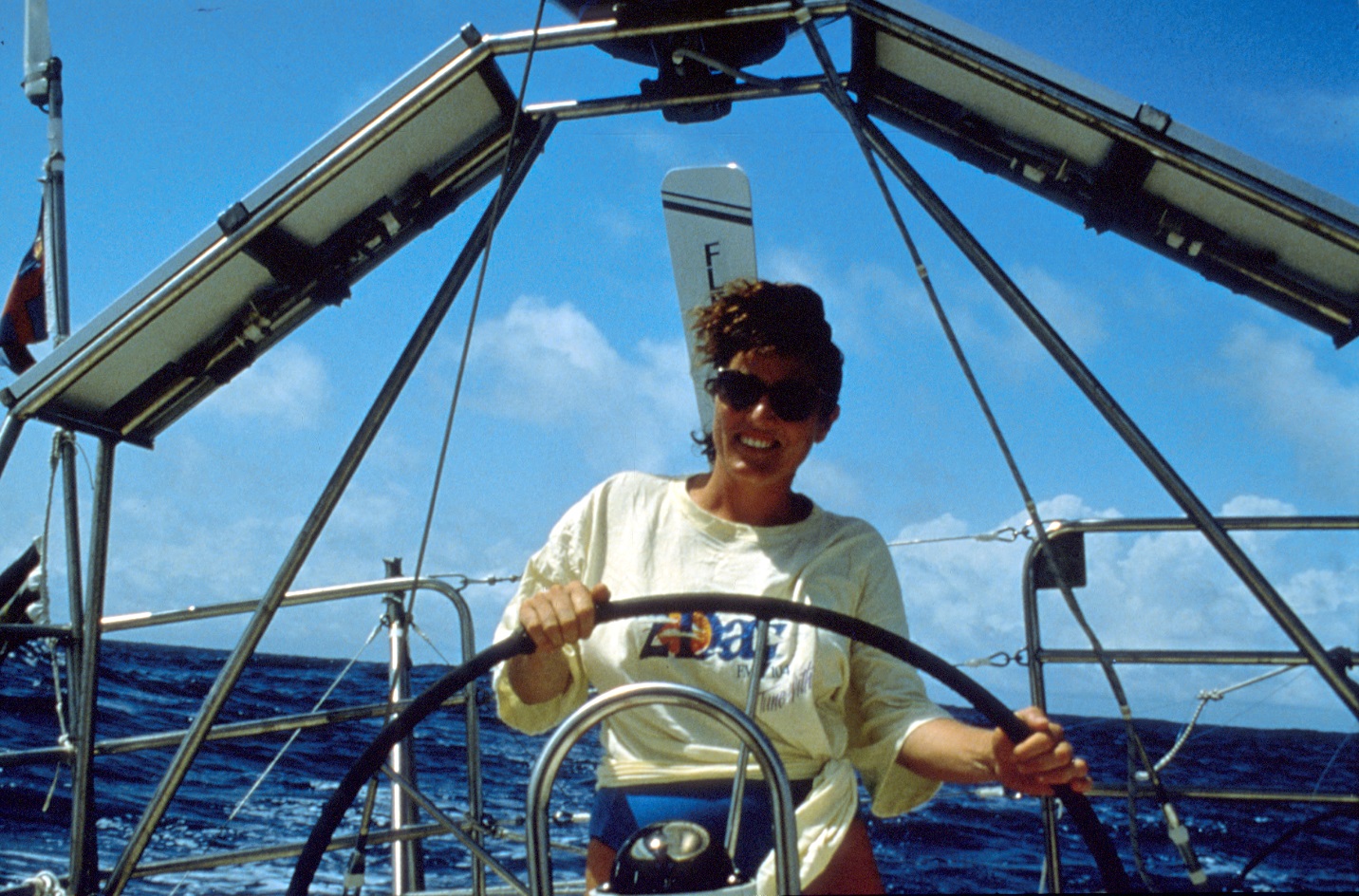 Kay Cottee at the tiller of her sailing ship, First Lady.