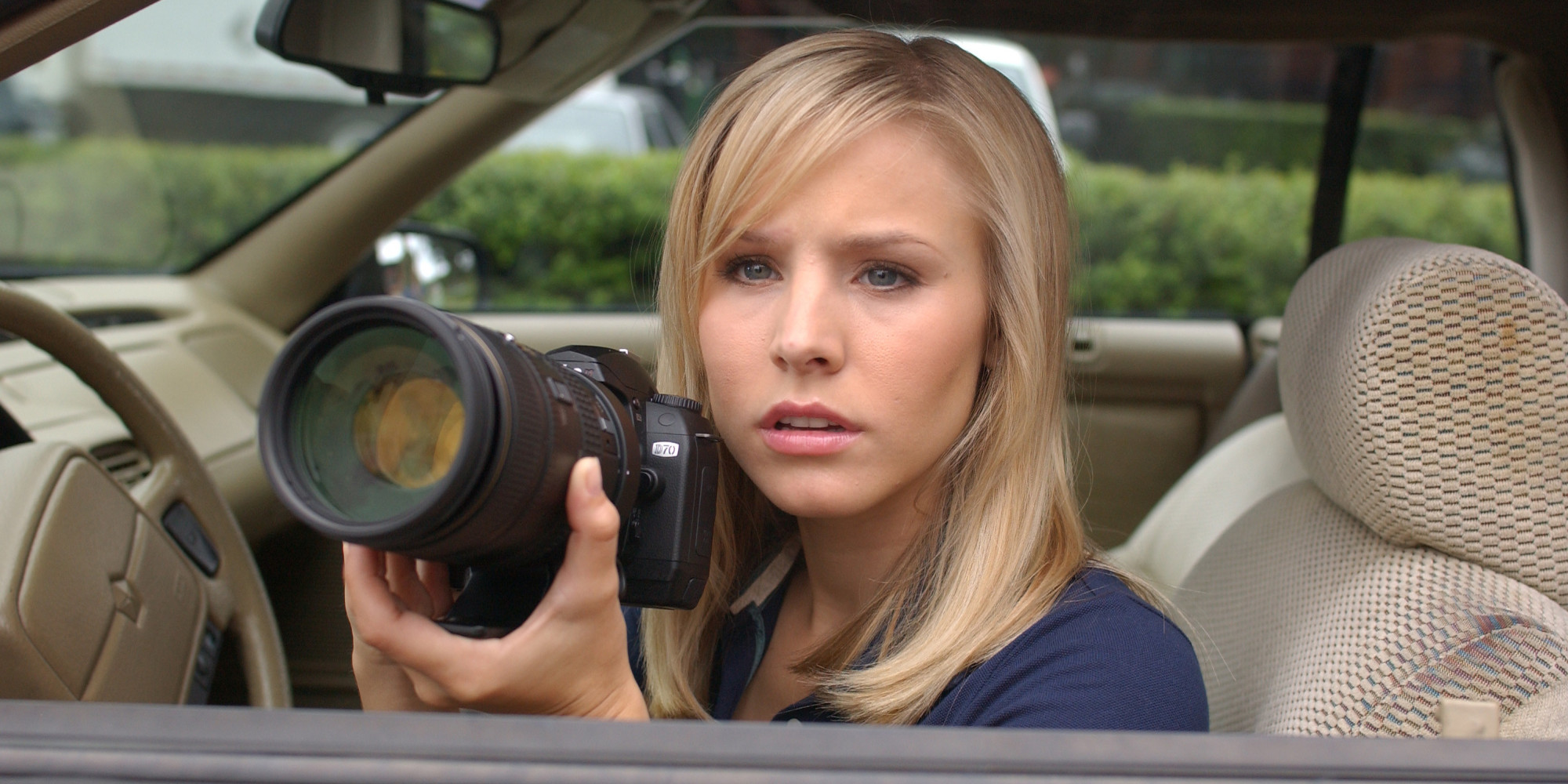 UNSPECIFIED - OCTOBER 05:  Medium shot of Kristen Bell as Veronica sitting in car, pointing camera.  (Photo by Ron Jaffe/Warner Bros./Getty Images)