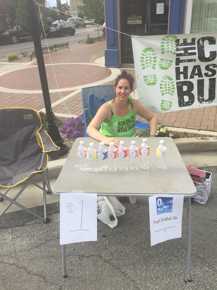 Team member Misty selling "bottled air" (and using the profits to buy something nice to the local police department!)