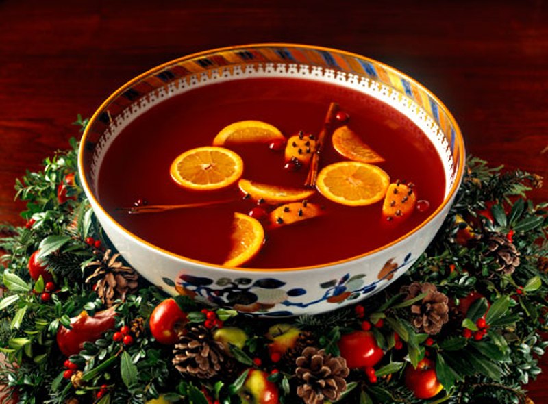 Wassail punch in bowl with greenery