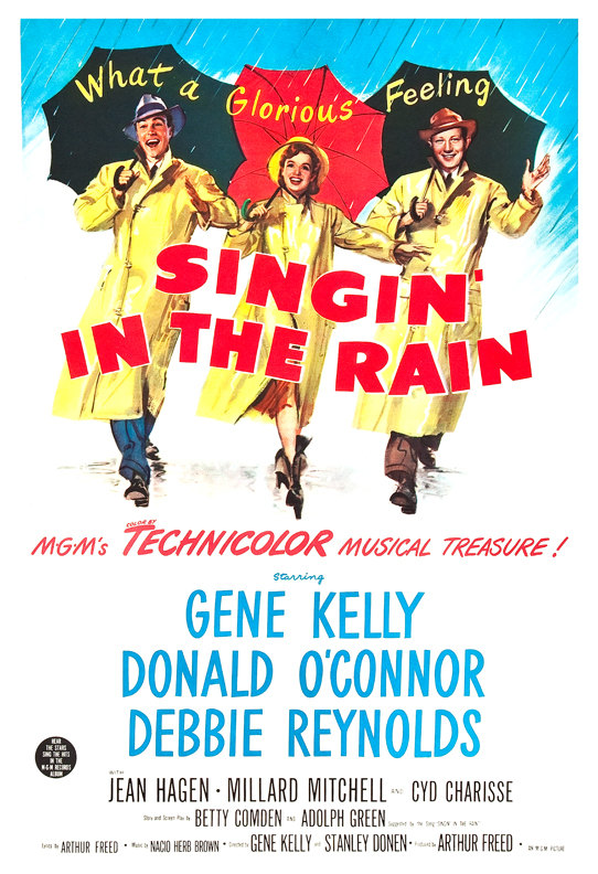 The film poster for Singin' in the Rain showing the three main stars, Gene Kelly, Debbie Reynolds, and Donald O'Connor wearing yellow rain coats, galoshes, and carrying umbrellas.
