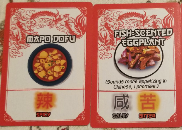Cards from the game Takeout. A blue card that show the Chinese characters for Salty, Sour, Spicy, Bitter, Sweet, and Cold with the header "Complete Flavors" and two individual cards of dishes "Mapo Dofu" and "Fish-scented Eggplant"