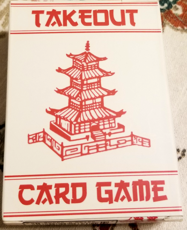 Deck box for the card game, Takeout. A white box with minimalist sketches of a pagoda in red.