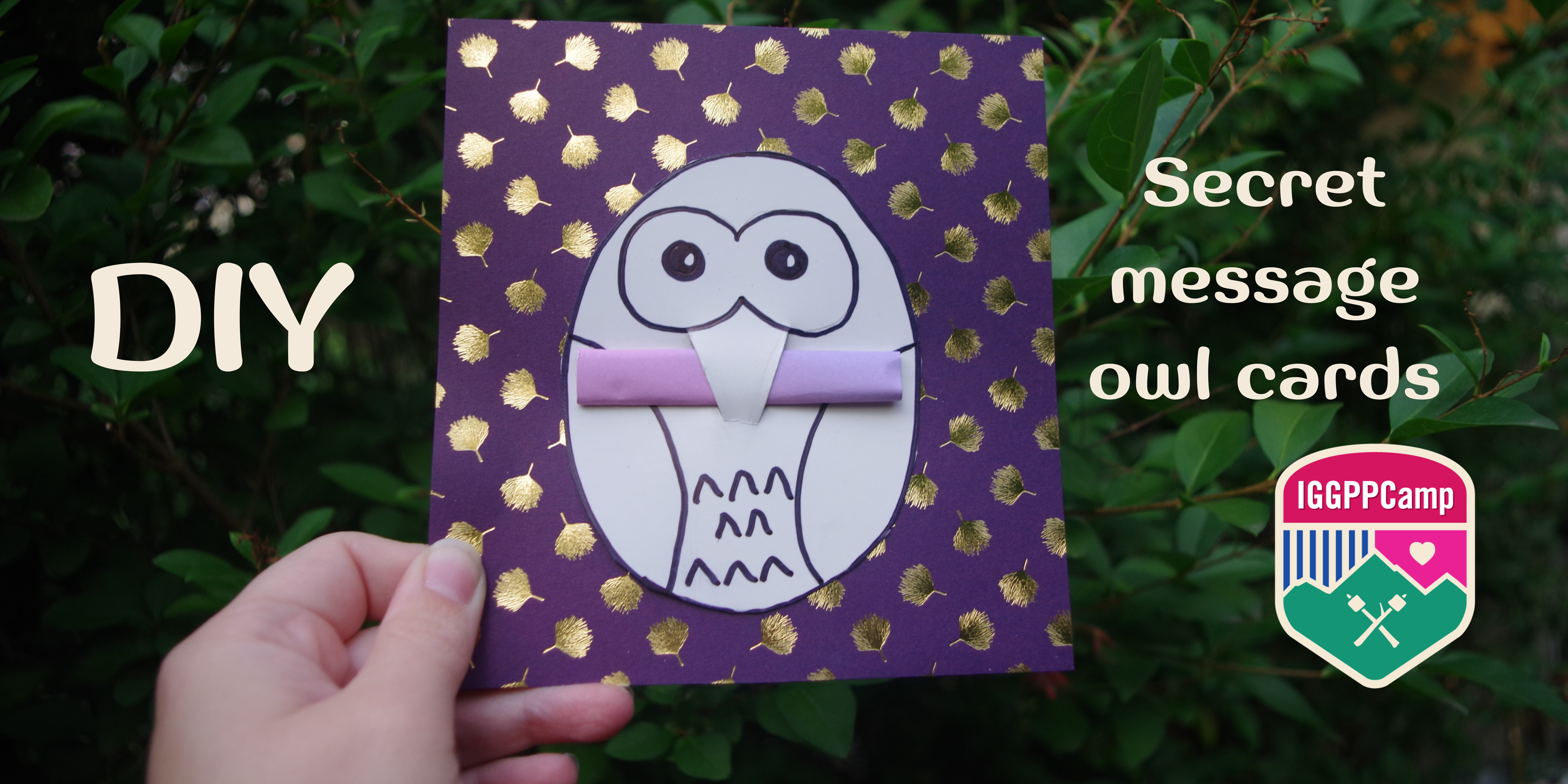 The completed secret owl message card! The owl is on dark purple card paper with a light purple note rolled up in its beak, all ready for sending to a friend!