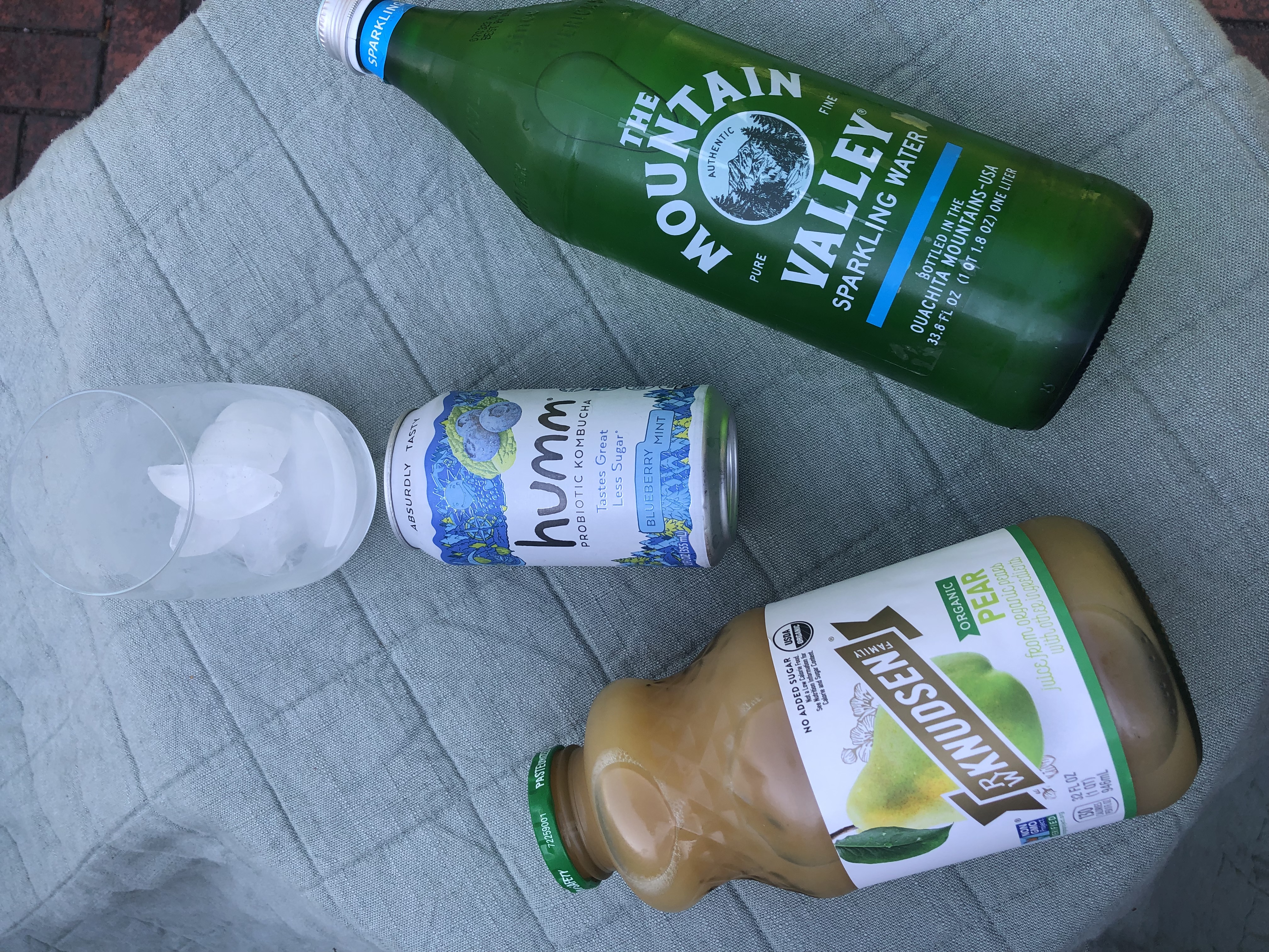 martini ingredients including pear juice, kombucha, and sparking water