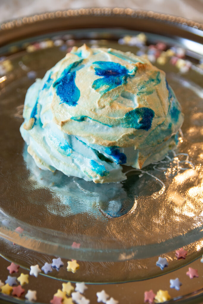 the finished treat is round with blue and gold swirls throughout